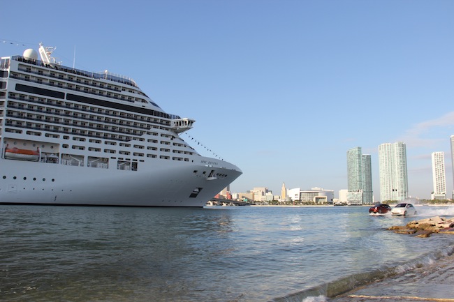 MSC Divian glides gracefully into Miami, while a clutch of Fiat 500 cars buzzed around her in the water