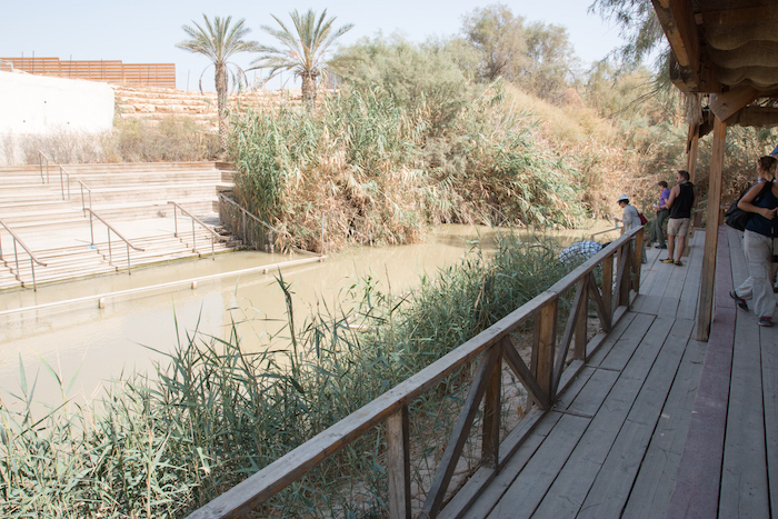 River Jordan at the The Baptism site of Jesus Christ showing both Jordan and West Bank / Israel sides